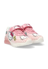 Zapatos infantiles rosas con un patrón de lunares, con gráficos de Hello Kitty, asegurados por una correa de Velcro, con suela blanca y rosa.