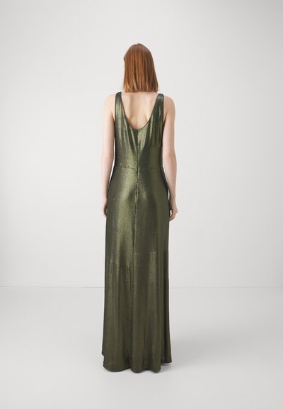 Long sleeveless dress in dark green shimmer fabric, featuring a low scoop back and a straight silhouette, accented by soft, flowing texture.
