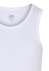 Hvid tanktop lavet af 65% viskose bambus, 30% økologisk bomuld og 5% elastan. Har en rund halsudskæring og er ærmeløs.