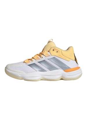 Sportschoenen met een witte mesh bovenkant, zilveren accenten, gele details en een oranje middenzool. Voorzien van een gevoerde kraag en een gestructureerde zool.