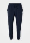 UNIQUE - Pyjamahousut/-shortsit - dark blue