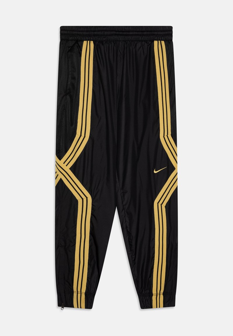 Sorte atletiske bukser med to vertikale gule striber på hver side, elastisk talje og zip-bund. Fremstillet af let materiale.