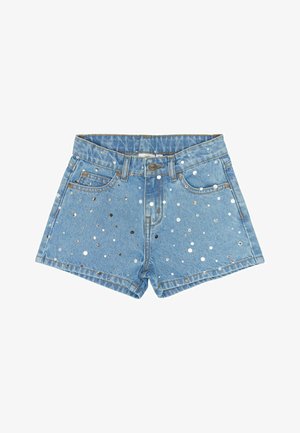 Hele sinised teksapüksid, millel on kõrge vöökoht, viie taskuga disain ja kangale laiali laotatud hõbedaste litrite kaunistused.