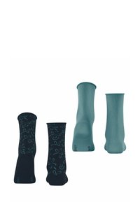 Zwei Paar Socken. Ein Paar in Marineblau mit türkisfarbenen Blumenmustern, das andere in einheitlichem Türkis. Beide mit gerippten Bündchen und weichem Material.