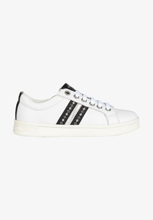 White leather sneaker with black stripes featuring decorative patterns, round toe, white sole, and contrasting black accents on the heel.