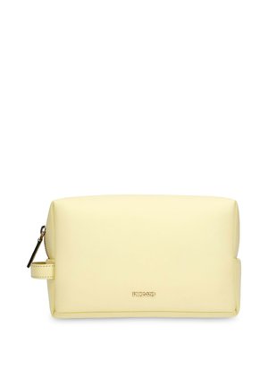 Rectangular pale yellow toiletry bag with a side handle, zip closure, and small gold "Picard" logo on the front center.
