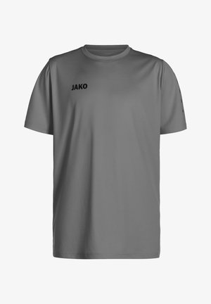 Grijze t-shirt met korte mouwen, gemaakt van gladde stof. Heeft een ronde halslijn en een zwart "JAKO" logo op de linkerborst. Eenvoudig ontwerp, zonder patronen.