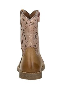 Brown leather ankle boot with a pink perforated upper featuring floral cutouts, rounded toe, and a textured sole.