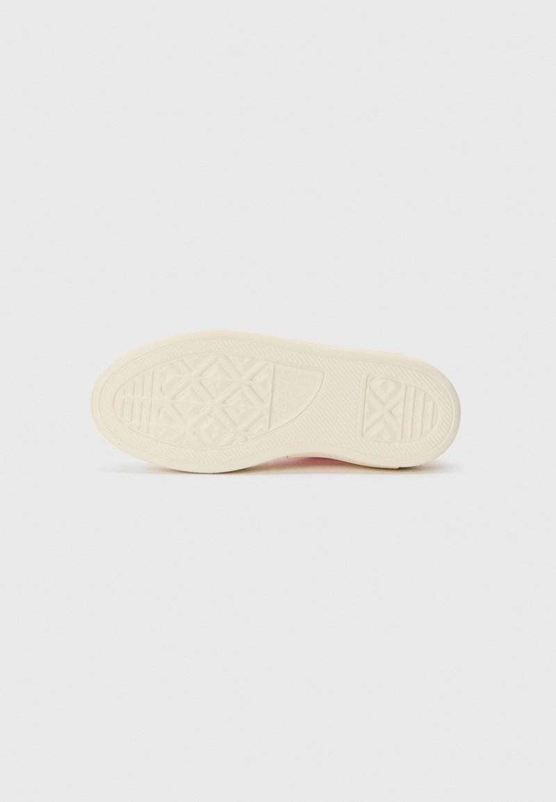 Gummisohle für Sneaker in Off-White mit strukturiertem Grip-Design. Besitzt eine leichte Krümmung und gemusterte Details für besseren Halt.