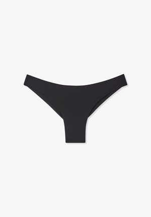 Perizoma nero senza cuciture con cintura a vita bassa e copertura minima, mostrato su sfondo bianco.