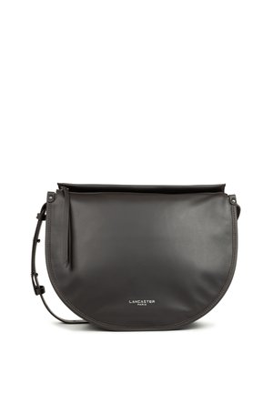 Black leather shoulder bag with a semi-circular shape, top zipper closure, and adjustable strap. Features a small logo in white text.