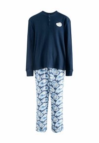 Top de manga larga de punto en color azul marino con tapeta de botones y parche de nube, combinado con pantalones de pijama de tejido suave con un estampado floral azul.