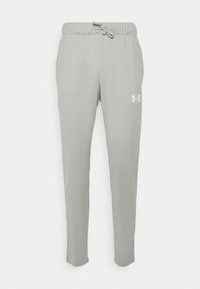 Pantalon de sport gris clair avec taille élastique et cordon, avec le logo Under Armour sur la cuisse droite.