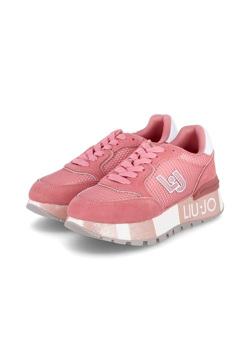Sneaker rosa realizzati in materiali mesh e suede, caratterizzati da una parte superiore testurizzata, una suola bianca spessa con accenti glitterati e un dettaglio del logo ricamato.