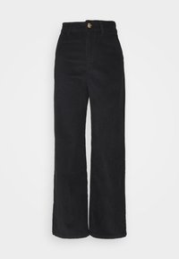 Schwarze Cordhose mit weitem Bein, auffälligen vertikalen Rippungen, einem Knopfverschluss am Bund und einer strukturierten Oberfläche.