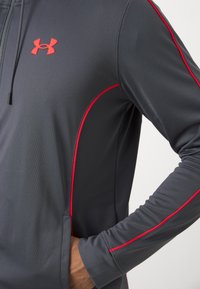 Under Armour TRACKSUIT - Tracksuit - castlerock/racer red