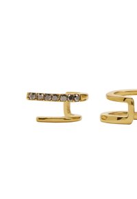 Kolczyki z metalem w kolorze złota o minimalistycznym designie z prostym prętem ozdobionym pięcioma małymi szarymi kamieniami.