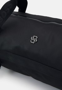 BOSS HOLDALL - Nedidelis kelioninis krepšys - black