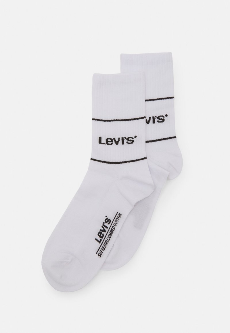Baltas kokvilnas zeķes ar melnām svītrām. Ar "Levi's" logo, kas izdrukāts sānos. Gluda tekstūra, standarta zeķu garums un pieguloša forma.