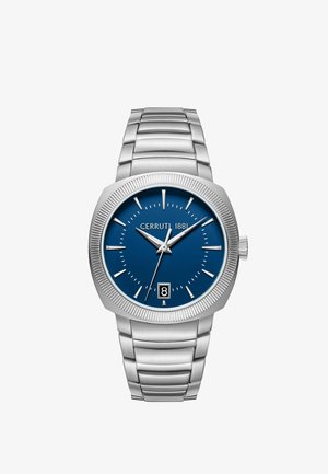 Reloj de pulsera de metal plateado con esfera azul, marcadores de horas plateados, manecillas que muestran las 10:10:34, ventana de fecha a las 6 en punto con el número "8" y correa de eslabones de acero inoxidable.