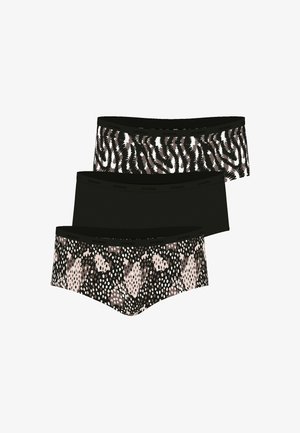 Trois culottes hipster pour femmes en noir, imprimé zèbre et imprimé serpent, disposées en couches sur un fond blanc.