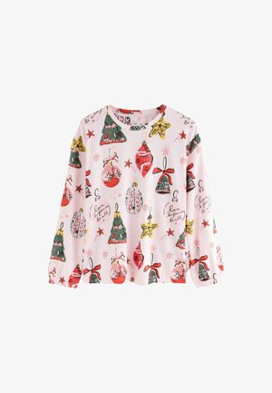 Langarmige roze top met een feestelijke print van kerstbomen, versieringen en sterren in verschillende kleuren. Zachte stof met een ronde halslijn.