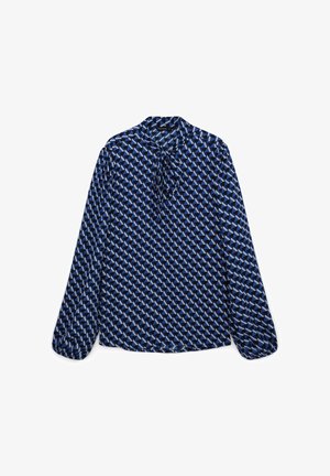 Blouse à manches longues avec un motif géométrique bleu et blanc, dotée d'un col rond et d'un détail noué au niveau du cou. Tissu à texture lisse.