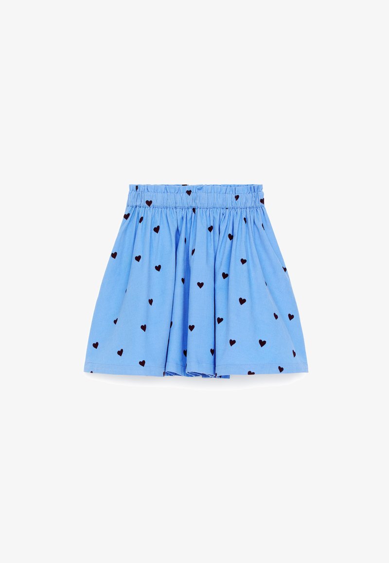 Jupe bleue froncée avec motif de cœurs noirs et taille élastique.