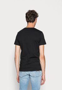 Calvin Klein Jeans CORE INSTITUTIONAL LOGO TEE - T-shirt con stampa - ck black