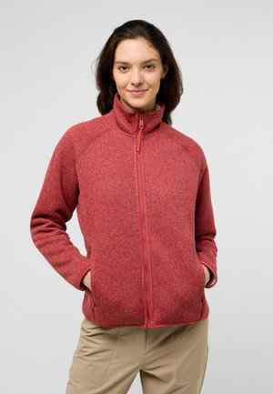 Rote Fleecejacke mit Reißverschluss und hohem Kragen, strukturiertem Strickstoff und Seitentaschen. Mit kontrastierenden Reißverschlüssen und Stichdetails.