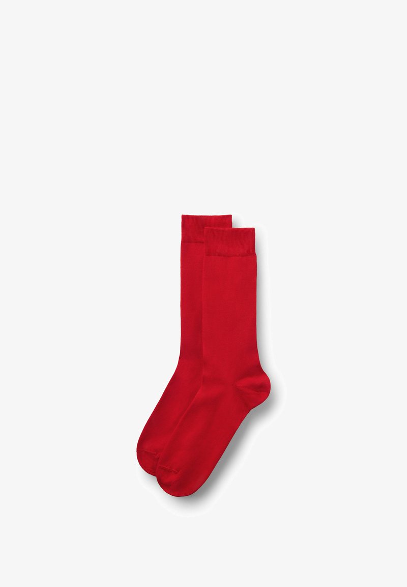 Rote Baumwollcrew-Socken mit glatter Textur, mit einem gerippten Bündchen und nahtlosem Zehenbereich. Ideal für den täglichen Gebrauch.