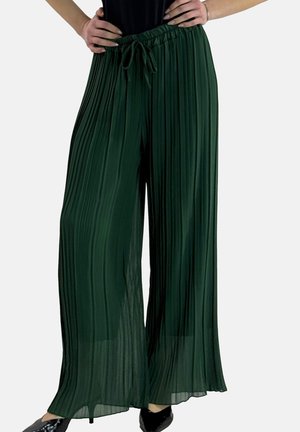 Pantalones anchos verdes plisados con cintura elástica y cordón ajustable, con una textura de tela ligera y fluida.