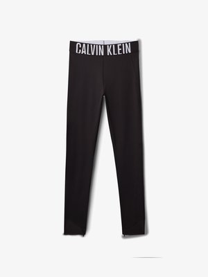 Leggings pretos com um logo branco "CALVIN KLEIN" na cintura. Material suave, design ajustado, com detalhes em malha nos tornozelos.