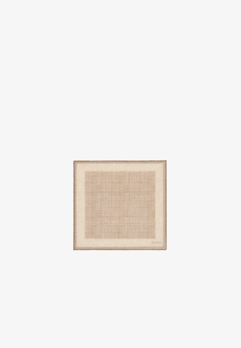 Tissu carré beige avec un motif à carreaux clair, bordé d'une bande unie plus claire et fini par un bord tressé.