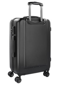 Valigia rigida nera con superficie testurizzata, manico estensibile, manico laterale e quattro ruote scorrevoli per una facile mobilità.