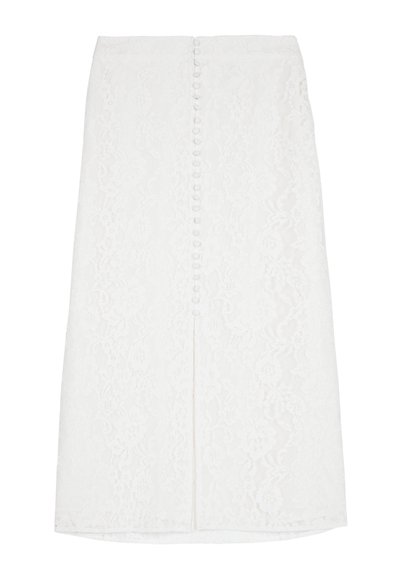Witte kanten midi rok met bloemenpatroon, knoopsluiting aan de voorkant en een split in het midden voor.