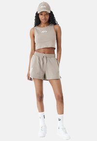New Era Jogginghose - brown
