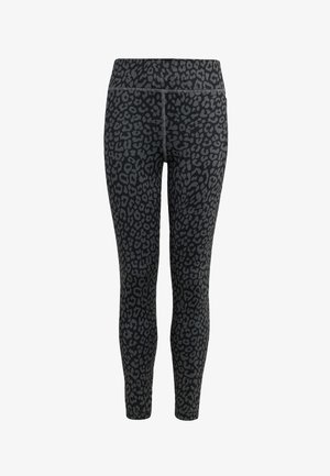 Leggings noirs avec un motif léopard gris, dotés d'une taille haute et d'une texture lisse et extensible.