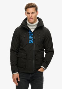 Superdry & Co ULTIMATE SD CHEATER - Chaqueta de entretiempo - black blue bay