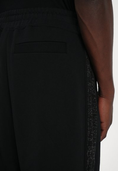 Les Benjamins Παντελόνι φόρμας - black