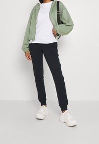 Superdry & Co Träningsbyxor - dark blue