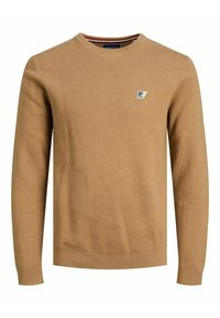 Ruskea neulepusero, joka on valmistettu puuvillasta, jossa on pyöreä kaula-aukko, pitkät hihat, resorireuna ja hihansuut sekä pieni logo rinnassa.