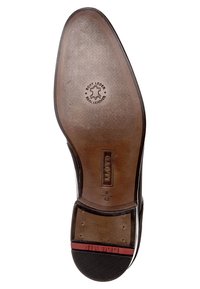 Leder-Schuhsohle mit strukturiertem Design, versehen mit einem kreisförmigen Logo, das "Echt Leder" lautet, und einer glatten braunen Oberfläche mit roten Akzenten.