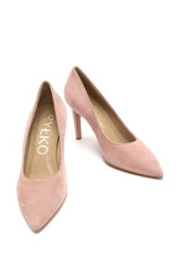 Pink suede high heels with pointed toes and slender stiletto heels. Features a smooth inner lining and embossed logo on the insole.
