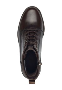 Bottine en cuir marron, avec un bout arrondi, un laçage à l'avant, des détails en zip et une texture lisse agrémentée de subtils accents de couture.