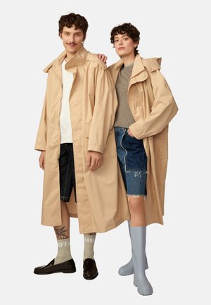 OVERSIZE - Waterproof jacket - beige