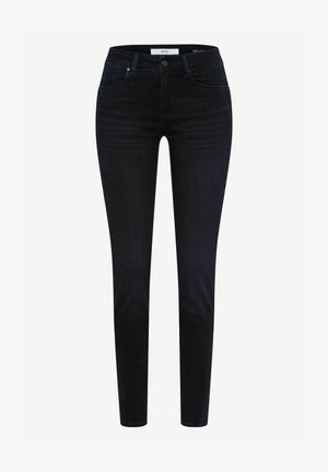 Skinny jeans in donkerblauwe denim met een gladde textuur, voorzien van een middelhoge taille, vijf zakken en minimale hardwaredetails.