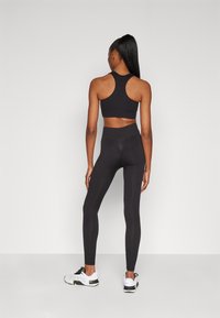 Hunkemöller Leggings - Byxor - black