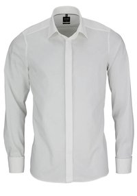 Witte blouse gemaakt van gladde katoen. Heeft lange mouwen, een standaard kraag en een eenvoudig ontwerp zonder patronen of accenten.