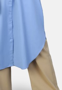 Modanisa BENIN - Blusa - blue